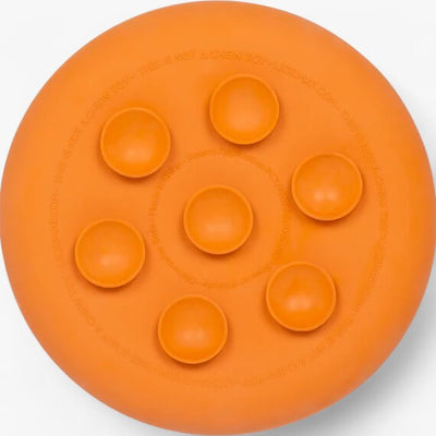 LickiMat UFO slow feeding bowl for dogs with suction cups and 3D texture design in vibrant orange color.