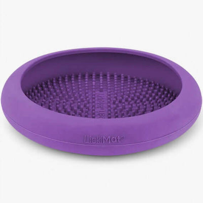 LickiMat UFO slow feeding bowl in purple, designed for dogs to promote relaxation and stress relief.