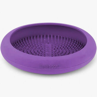 LickiMat UFO slow feeding bowl in purple, designed for dogs to promote relaxation and stress relief.